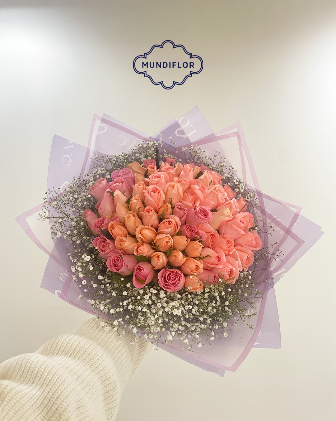 Arreglo floral con peluche